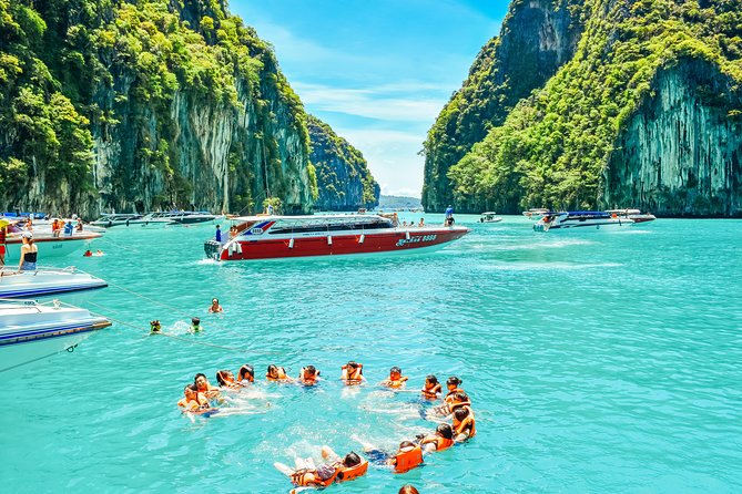 12 Islands Overnight Tour - Day 1: Phang Nga Bay icons, Ao Phang Nga canoeing, and a Phi Phi fire-and-boxing night