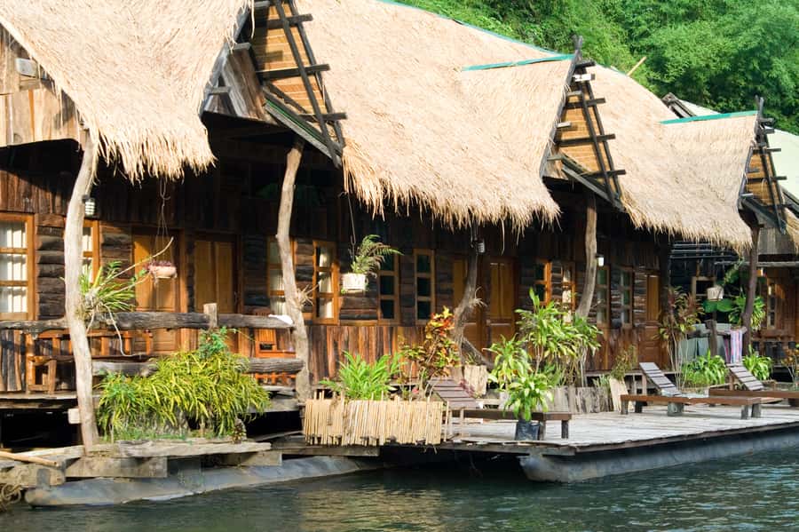 3-Day River Kwai, Floating Market and Erawan Waterfalls - Hellfire Pass to the water: getting to your floatel by long-tail boat