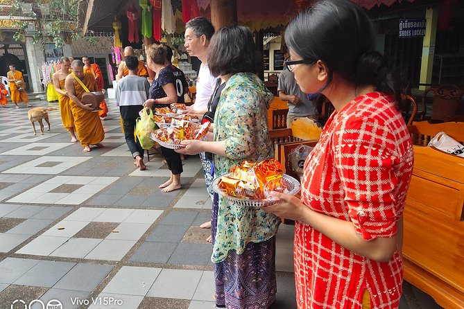 4 highlights: Sticky Waterfall/Elephants/local market /Wat Banden - Sticky Waterfalls: walking, soaking, and that massage-bathing vibe