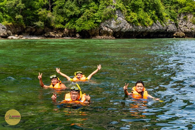 4 Islands Day Tour by Speed Boat from Ao Nang, Krabi - Stop 2: Chicken Island Rock Formation and Quick Beach Time