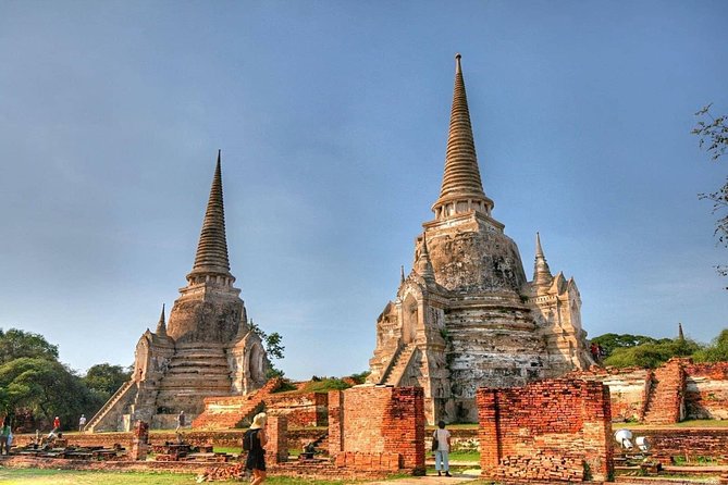 Afternoon Ayutthaya heritage site & River Boat Ride at Sunset - Wat Mahathat: the tree-root Buddha head moment