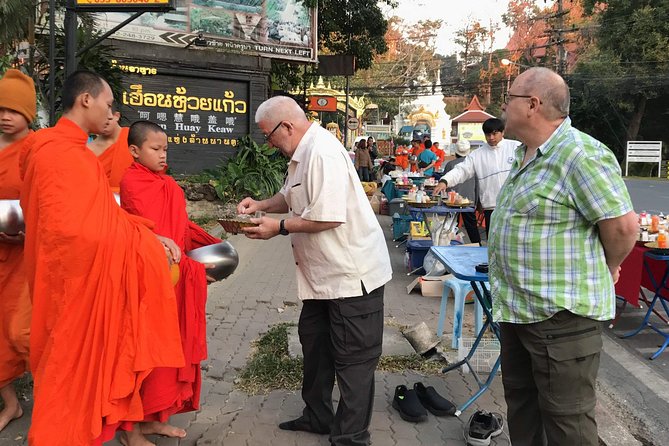 Alms and Wat Phra That Doi Suthep Private Chiang Mai Tour - Warorot Market time: browse with a purpose
