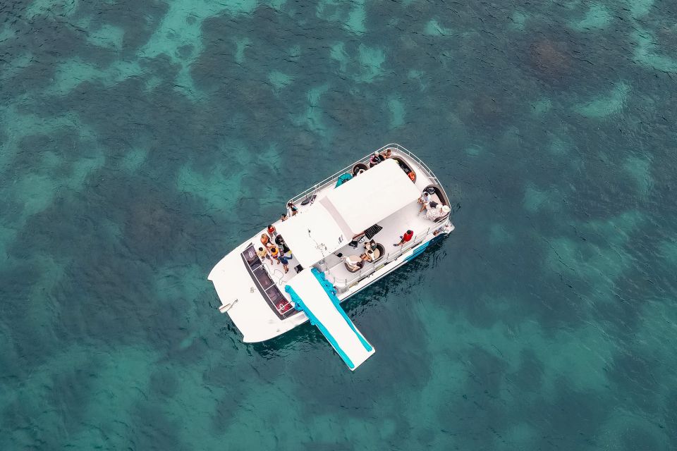 Amazing Coral Island & Sunset Dinner with Power Catamaran - Promthep Cape stop: a guided stretch before the onboard meal