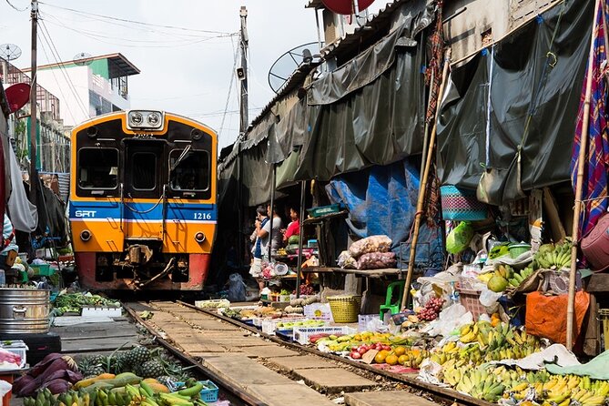 Amphawa Floating Market and Maeklong Train Market Tour - Guide quality and small-group pacing (max 9)