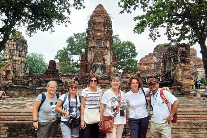 Ancient City & Temples of Ayutthaya ( UNESCO ) by River Cruise with Buffet Lunch - Wat Mahathat: the Buddha face in the tree roots