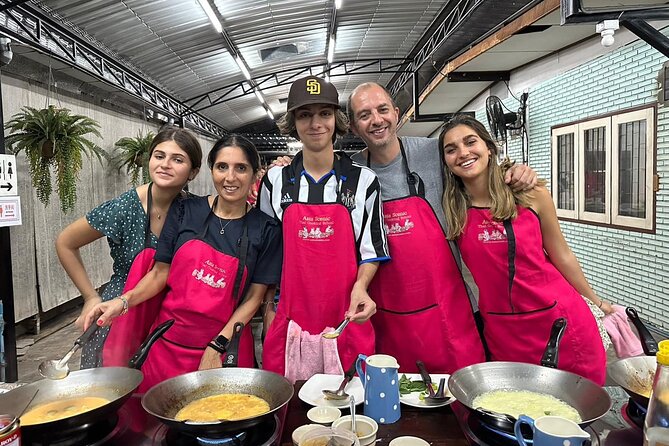 Authentic Thai Cooking Class and Farm Visit in Chiang Mai - Open-air kitchen cooking: hands-on help in a group of up to 12