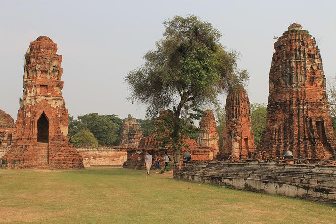Ayutthaya Day Tour By Coach and Cruise - Wat Lokayasutharam (Temple of the Reclining Buddha): the big visual payoff