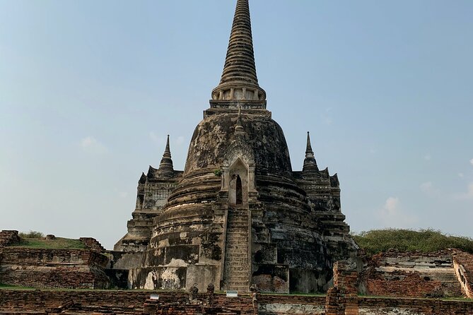 Ayutthaya Sunset Join Tour, Boat Ride, Famous Spot & Local Market - Wat Mahathat: The Buddha Relic Temple Stop That Anchors the Day