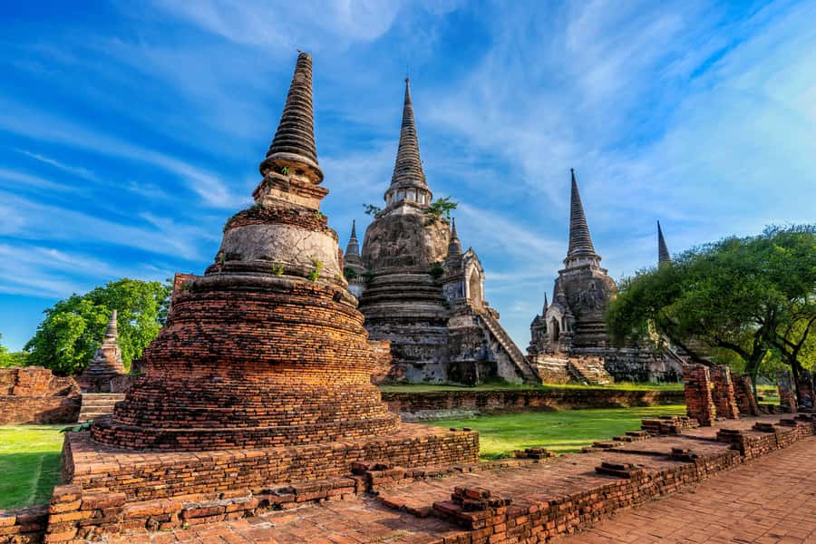 Ayutthaya: UNESCO Heritage Temples and Cafe Day Tour - Wat Maha That: The Buddha Head in Tree Roots Moment