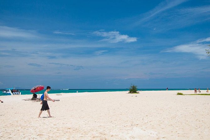 Bamboo Island, Maya Beach and Phi Phi Islands One Day Tour from Krabi - Viking Cave and Pileh Lagoon: limestone views plus a hidden-water moment
