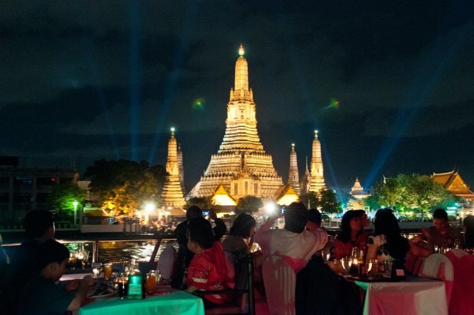 Bangkok: 2-Hour Dinner & Shows on White Orchid River Cruise - Sights lit up: Grand Palace, Wat Pho, Wat Arun, and the river-view bonus