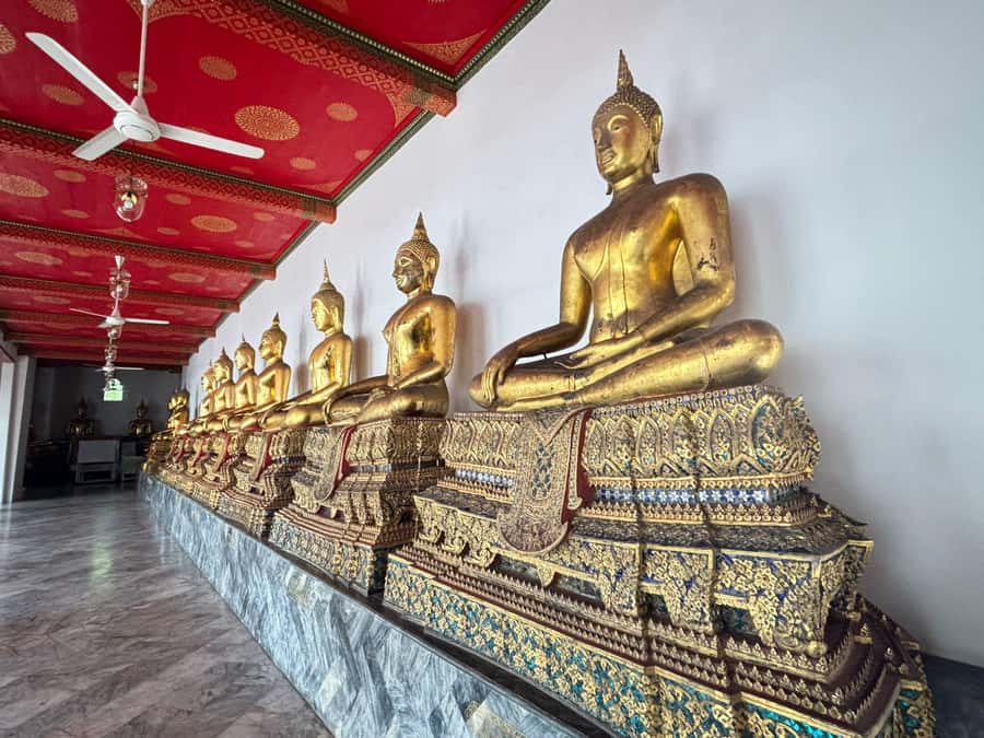 Bangkok 3-Major Royal Temples Walking Tour - Wat Pho: Reclining Buddha scale, murals, and temple stupa spots