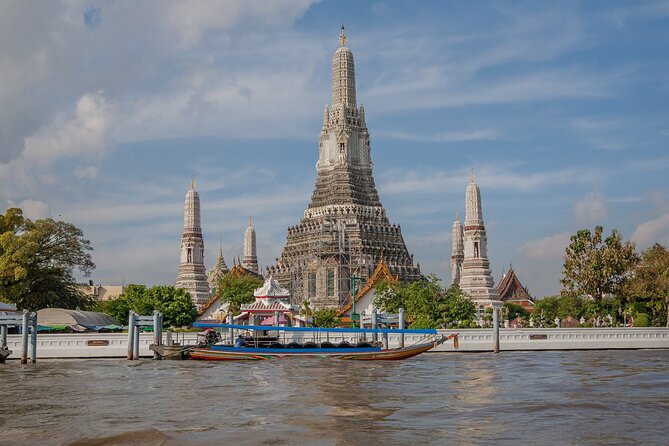 Bangkok 3 Temple Walking Tour: Wat Arun, Wat Pho, Wat Traimit - Wat Pho Reclining Buddha: Big Scale, Clear Flow
