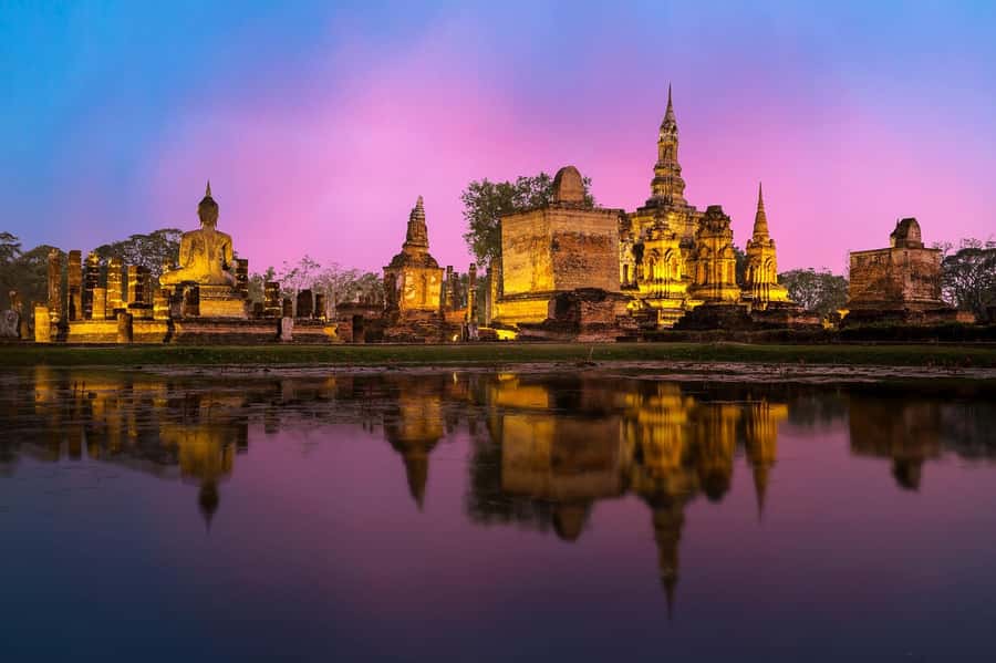 Bangkok: Ayutthaya & Local Market Tour In Spanish or English - Wat Yai Chai Mongkhon: the stupa, the reclining Buddha, and the monk rows