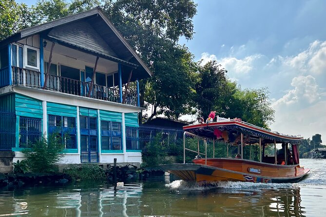 Bangkok Canal Shared Cruise by Longtail Boat - Wat Paknam Big Buddha from the water