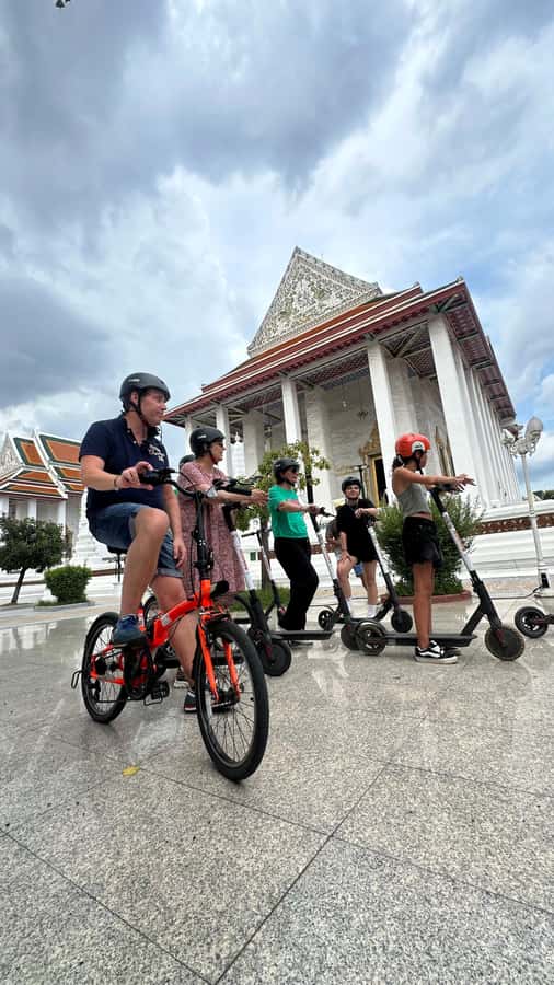 Bangkok: City Highlights Electric Scooter Tour - Meeting at 130 Soi Samsen 2: Gear, Safety, and First Impressions