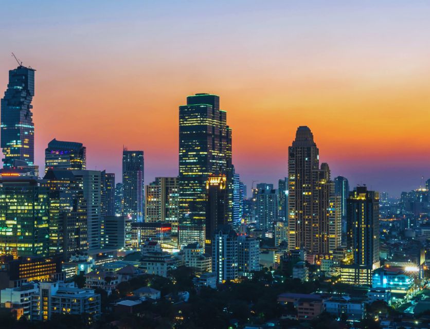Bangkok: City Highlights & Floating Markets Private Tour - Damnoen Saduak floating market: longtail boat cruising you can actually feel