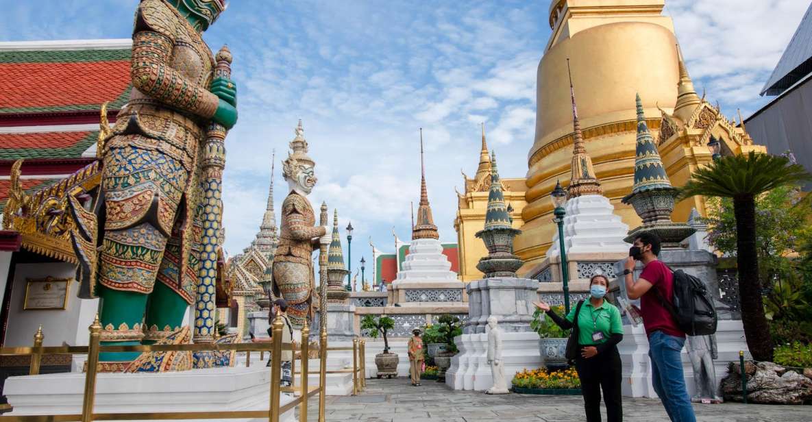 Bangkok: Grand Palace and Wat Arun Guided Walking Tour - Meeting at Golden Place: timing, traffic, and what to wear