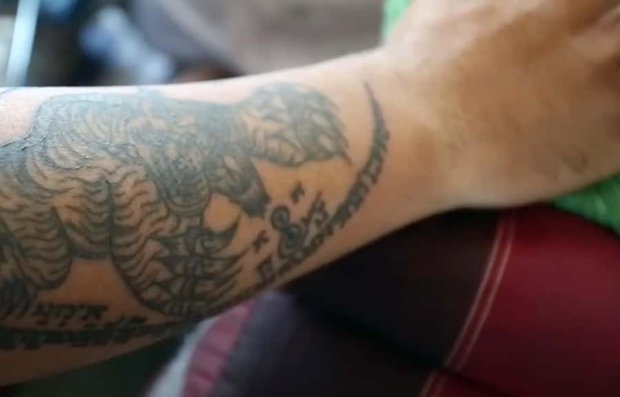 Bangkok: Hand-Poke Tattoo Guide at Wat Bang Phra & Blessing - Practical comfort tips: making it easier on your body and mind