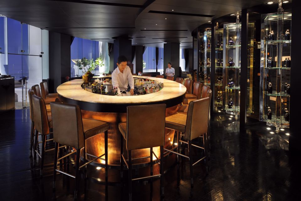 Bangkok: Lebua Rooftop Bar Reservation & Round-Trip Transfer - Entering Lebua No.3 on the 52nd floor for gin, caviar, and party lights