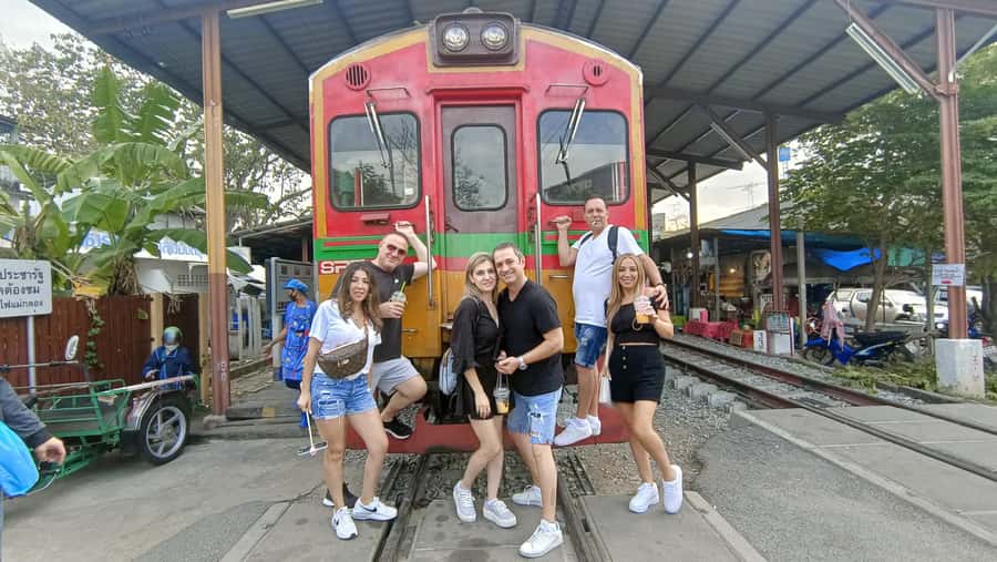 Bangkok: Maeklong Railway & Damnoen Saduak Floating Markets - Maeklong Railway Market: standing beside the track