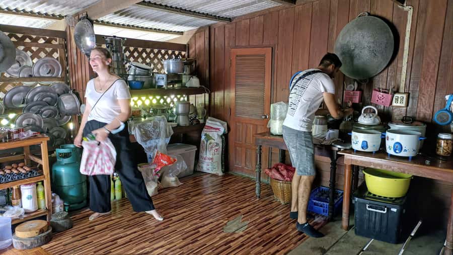 Bangkok: Maeklong Railway & Damnoen Saduak Floating Markets - Coconut grove village: learning how coconut sap becomes sugar