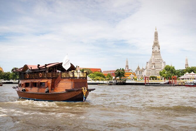 Bangkok Manohra Cruise Sunset Dining on Chao Phraya River - Sailing Past Iconic Temples: Wat Arun, Wat Pho, and the Grand Palace From the Water