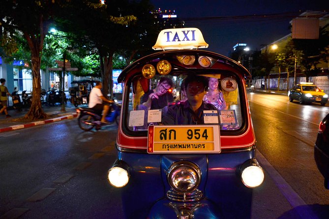 Bangkok Night Food and City Tour by Tuk Tuk - Wat Arun at the deck bar, plus a pass by the Giant Swing