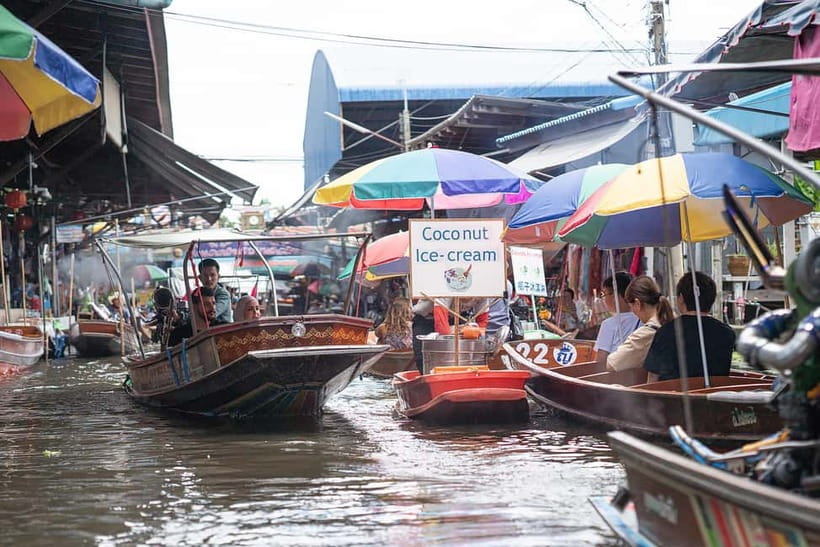 Bangkok: Premium Damnoen Saduak & Railway Market By Food Bus - Lat Yai: photos with the Thai script signboard and a slower train feel
