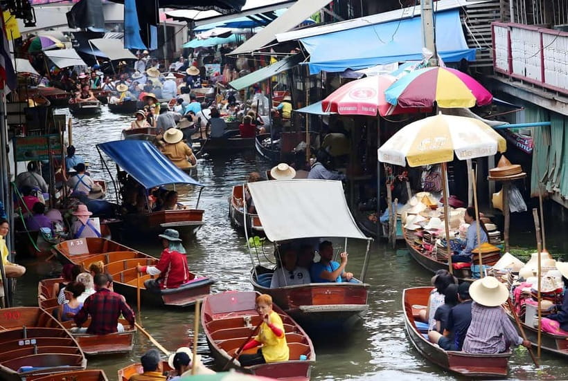 Bangkok: Railway, Floating Market & Chao Phraya Cruise Tour - Damnoen Saduak Floating Market: canal trading, paddle-boat pace