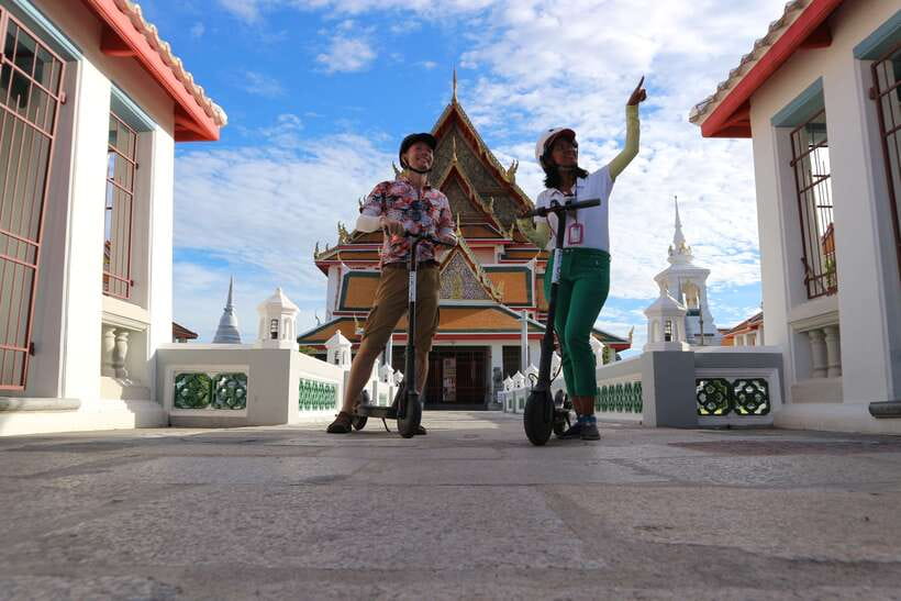 Bangkok: Riverside E-Scooter Adventure with StreetFood Snack - Chinatown by scooter: famous street food plus community history