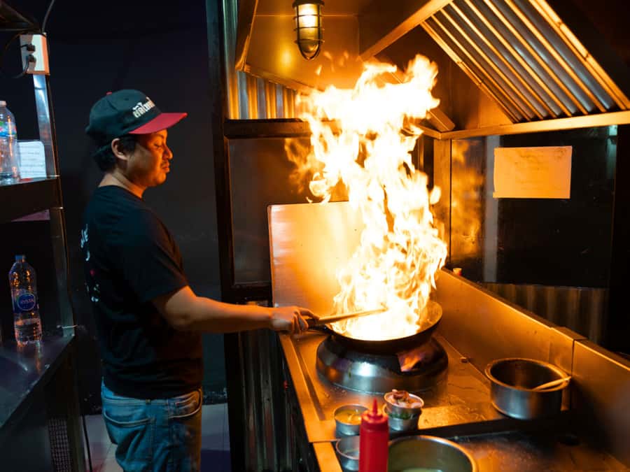 Bangkok Street Food and Night Lights by Tuk Tuk - Stop 1: Trok Rong Moo for noodles and street energy