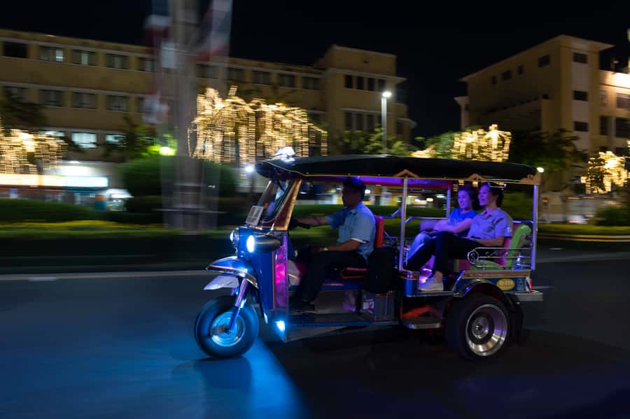 Bangkok Street Food and Night Lights by Tuk Tuk - Grand Palace photo stop, Tha Tien–Rajinee stroll, and Wat Arun across the river