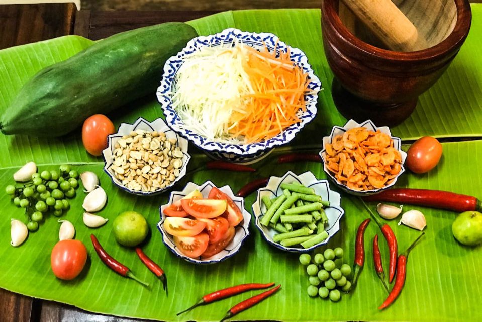 Bangkok: Thai Cooking Class and Onnuch Market Tour - The Cooking Station: Hands-On Guidance for Spices, Herbs, and Timing
