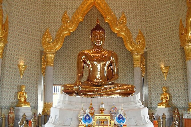 Bangkok’s Three Iconic Temples: Wat Traimit, Wat Pho & Wat Arun - Wat Arun at the Chao Phraya: Temple of Dawn spires in daylight
