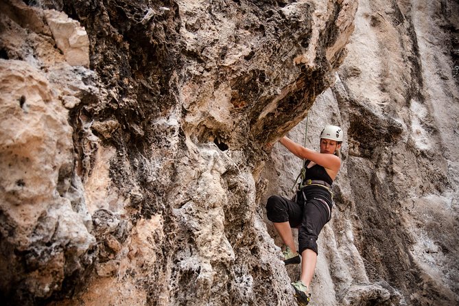 Beginner's Full Day Rock Climbing and Caving Tours at Railay Beach in Krabi - Railay rock climbing and caving: why this day feels different