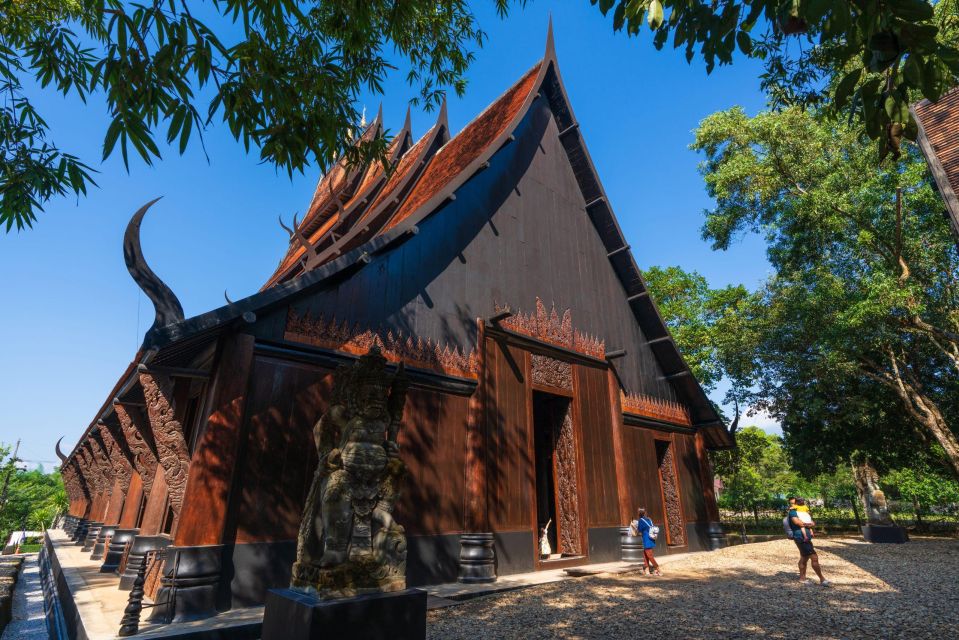 Chiang Mai: Chiang Rai Temples & Black House Discovery Tour - Baan Dam (Black House): modern Thai art in a dark, stubborn setting