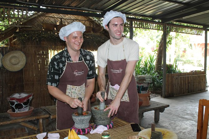 Chiang Mai Lanna Northern Thai Cooking Experience with Locals - Your Four-Dish Lineup: Khao Soi, Kaeng Hung Lay, Abb Moo, and Sai Aou