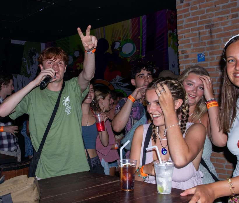 Chiang Mai Pub Crawl: The Best Nightlife in Town! - Karaoke: the moment the whole group becomes one team