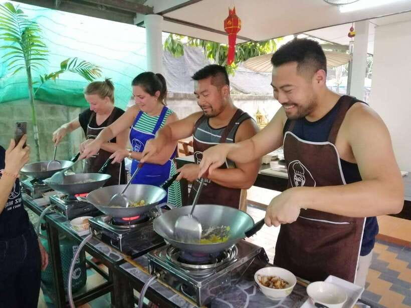 Chiang Mai: Thai Cooking and Market Tour with Lanna Smile - Cooking at your own station: what the instruction feels like