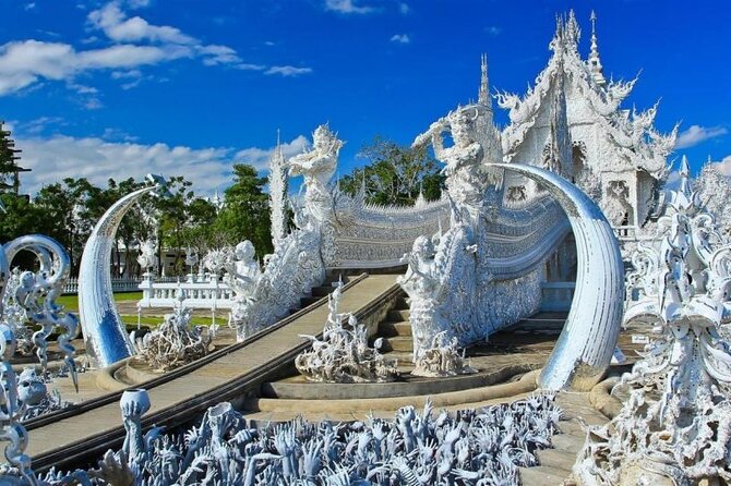 Chiang Mai to Chiang Rai White, Blue, Red Temples Long Neck Tour - Wat Rong Suea Ten (Blue Temple): Calm Blue Roof and Golden Details