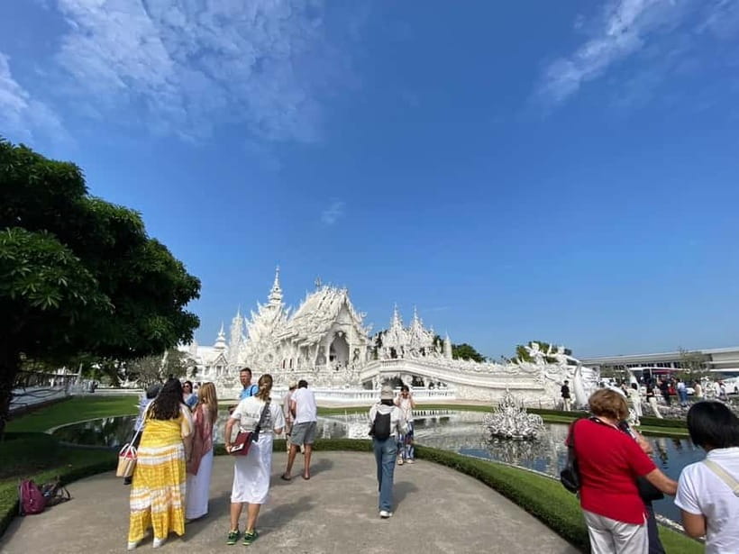 Chiang Rai: 3 Temples, Long Neck Village & Lalitta Café - Blue Temple (Wat Rong Suea Ten): sapphire hues, Naga guards, and Lanna lines