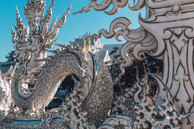 Chiang Rai Famed Temples and Golden Triangle Tour from Chiang Mai - Golden Triangle: Mekong boat ride and the feeling of three countries meeting