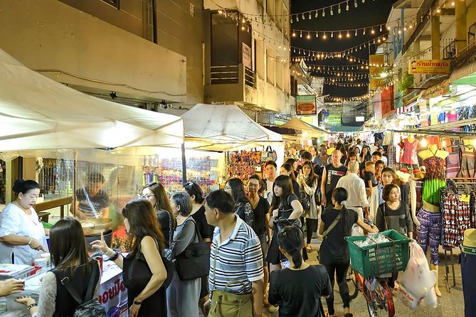 Chiang Rai Food & Night Market Walking Tour with Local Host - Getting around in an air-conditioned car without losing the street vibe