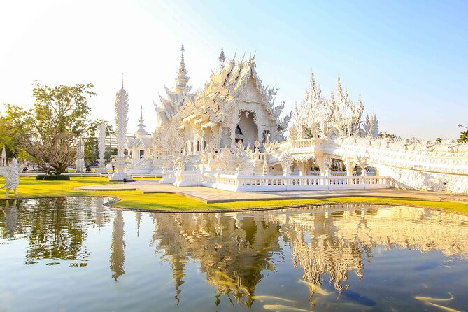 Chiang Rai Full Day Tour with Boat Trip and Longneck Village - Wat Rong Khun White Temple: the dress code and why it looks otherworldly