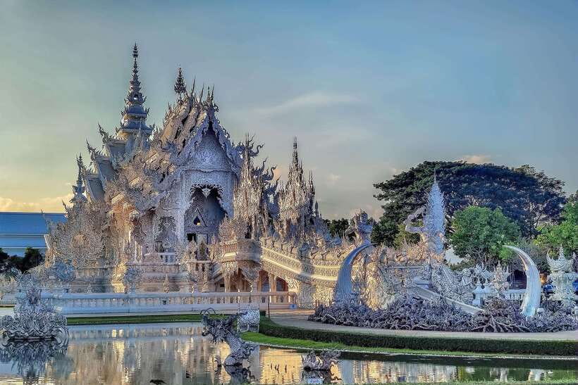 Chiang Rai: Half Day Tour – 3 Famous Temples & Lalita Cafe’ - Stop 2: Wat Rong Suea Ten and how the Blue Temple got its look