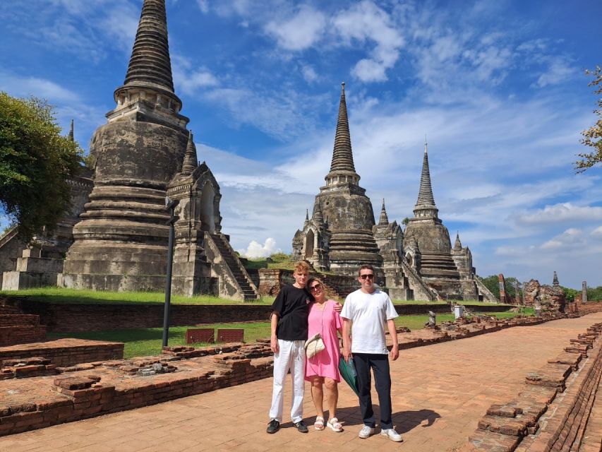 Colors of Ayutthaya: UNESCO Heritage 6 hour Bicycle Tour - Market snack stop: baked and fried local favorites