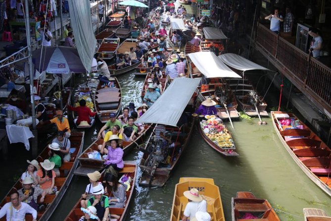 Colors of Damnoen Saduak from Bangkok - Boat canals, then bike lanes: what the day feels like