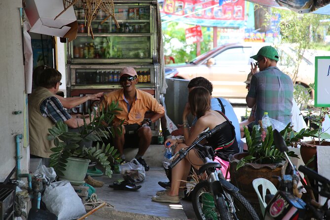 Colors of Damnoen Saduak from Bangkok - Wat Bang Kung: banyan roots and gold-leaf details
