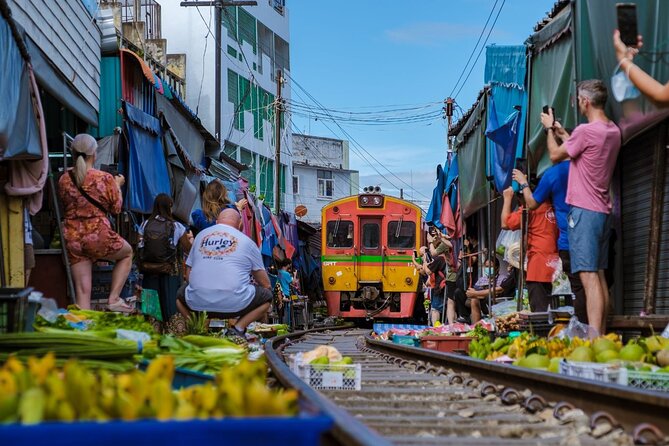 Damnoen Saduak Floating Market & Ayutthaya Tour from Bangkok - Stop 1: Mae Klong Railway Market and why the train moment is the point